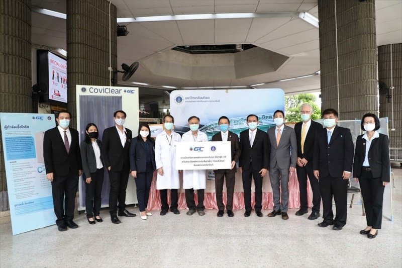 Dr. Kongkrapan Intarajang, CEO of GC, together with the executive team, present CoviClear, or the silver nanoparticle disinfection unit, to help reduce the risk of contracting COVID-19, along with PPE, to Ramathibodi Hospital